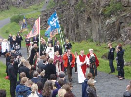 Hilmar Örn Hilmarsson and other members of Ásatrúarfélagið walk to a blót at Þingvellir in the summer of 2009.
